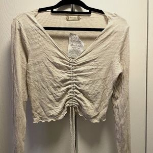 Long sleeve beige crop top